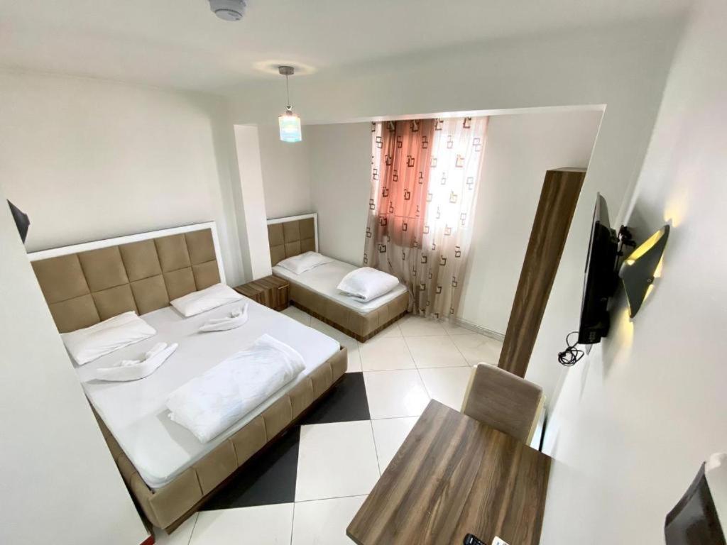 Hotel Heimli Приштина Экстерьер фото